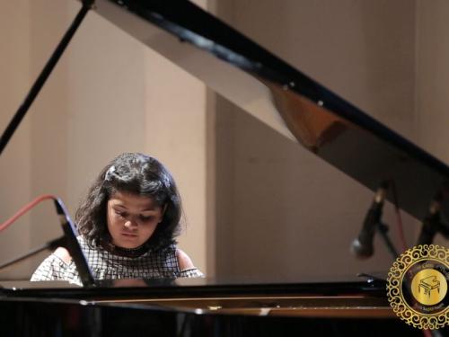 Piano classes in Delhi Student playing piano