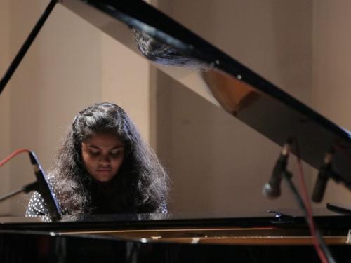 Piano classes in Delhi Student playing piano